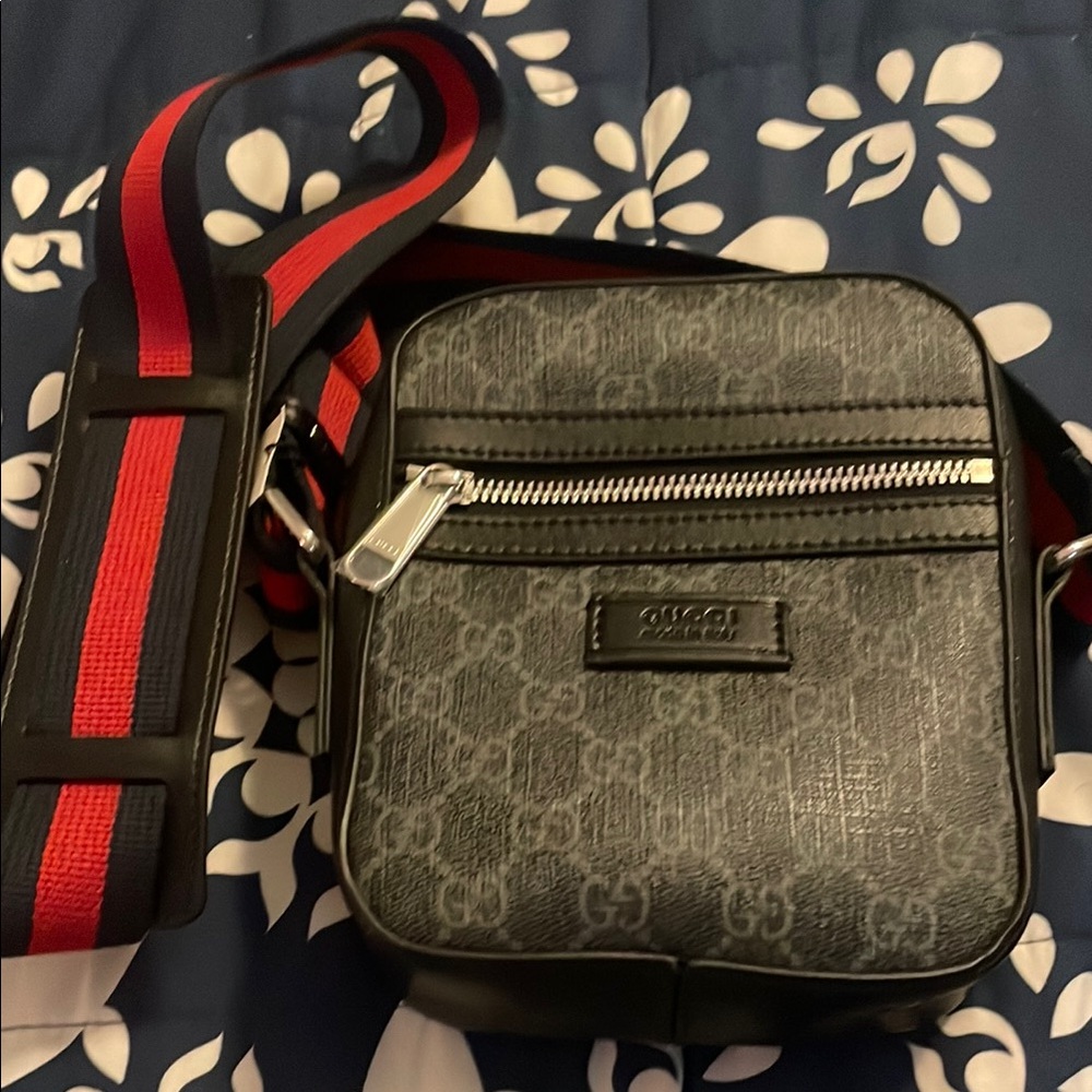Black Messenger Bag with red and black strap